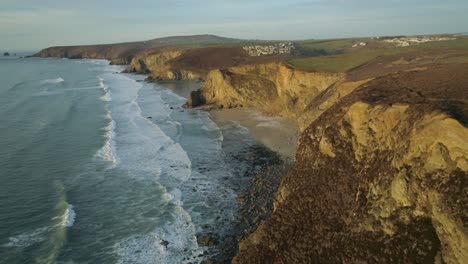 Sunset-aerial-overlooking-the-beach-at-Porthtowan-Cornwall-England-UK
