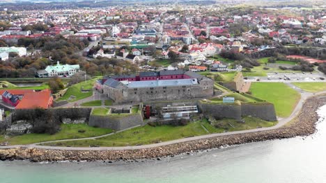 Hyperlapse-aerial-view-of-old-fortress-by-the-ocean