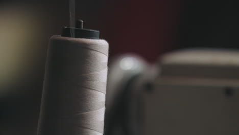 Static-Shot-Of-Spool-Thread-On-A-Sewing-Machine