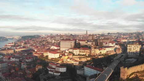 Aerial-view-of-the-city-of-Porto-and-Dom-Luis-I-bridge-during-sunrise-sunset