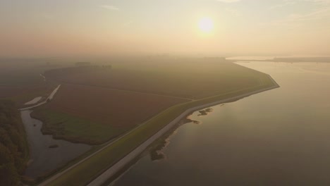 Aerial:-The-dykes-and-shoreline-of-the-Oosterschelde,-the-Netherlands