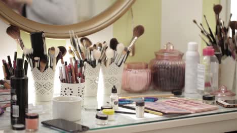 Professional-cosmetics-set-makeup-artist-on-the-table-in-the-studio