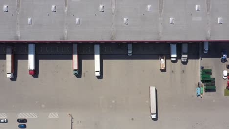 Logistics-warehouse-with-gates-for-loading.-Aerial-View