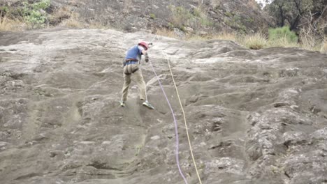 A-professional-mountain-climber-descending-the-mountain