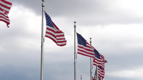 Close-up-of-American-flags-at-the-Washington-Monument-located-in-Washington-DC-in-the-USA