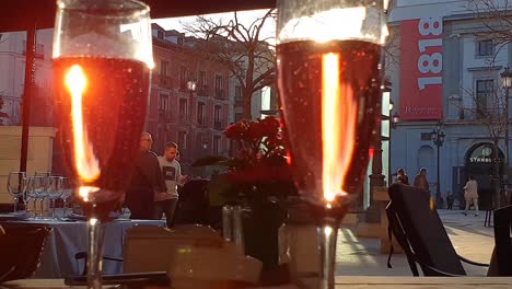 Festive-bubbles-rising-in-Sparkling-wine,-Tapas-bar-in-Madrid,-slow-motion