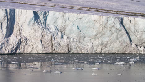 A-glacier-ice-shelf-with-scars-from-calving