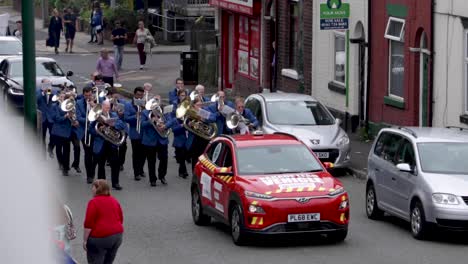 Radcliffe-community-parade-marching-through-streets
