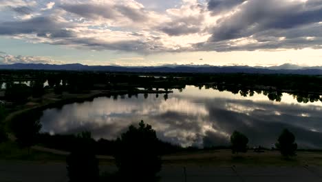 Be-humbled-in-awe-at-this-sunset-taken-by-drone-of-the-Rocky-Mountains-with-reflections-in-the-lakes-below