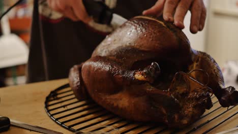 A-cooked-turkey-being-carved-with-an-electric-knife