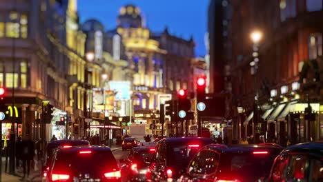 Looking-up-a-busy-Shaftesbury-Avenue-from-Piccadilly-Circus-at-dusk-with-Tilt-Shift-effect
