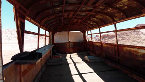 Going-inside-an-abandoned-bus-in-Atacama-desert,-South-America,-Chile