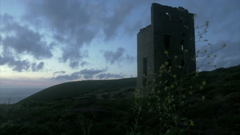 Evening-landscape-view-looking-up-at-Cornish-mine-engine-house