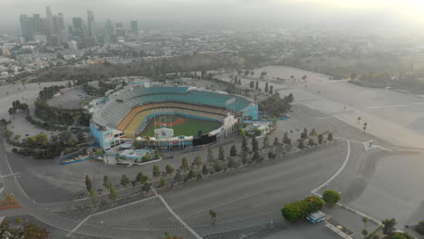 Aerial-of-Empty-LA-Dodgers-Stadium-with-Downtown-LA-Skyline