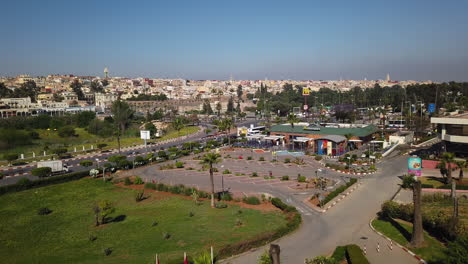 Panoramic-view-of-the-ancient-medina-town-of-Meknes-with-in-the-foreground-a-McDonald's-fastfood-restaurant