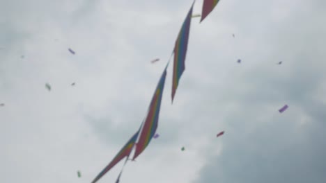 Leeds-Pride-LGBTQ-Festival-2019-confetti-shot-falling-with-pride-flags-in-the-background-4K-25p