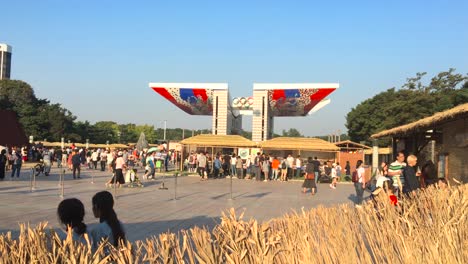 Crowds-in-front-of-the-Gate-of-Peace,-at-Hanseong-Baekje-festival,-Olympic-Park,-Oryun-dong,-Songpa-gu,-Seoul,-South-Korea