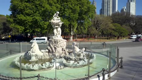 Beautiful-fountain-of-Las-Nereidas-and-Puerto-Madero-buildings-in-background