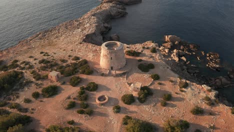 Flying-towards-pirate-lookout-tower-in-Ibiza