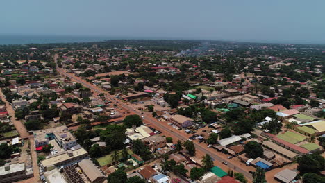 Aerial-flight-towards-an-unnamed-road-in-Serrekunda-above-the-Manjai-football-field