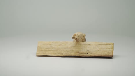 Two-Pieces-Of-Dried-Palo-Santo-Wood-Overlaps-Each-Other---Close-Up-Shot