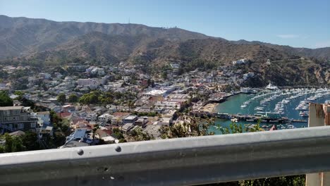 driving-down-mountain-road-looking-to-the-side-overlooking-Catalina-Harbor