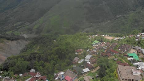 4k-Aerial-Spiral-Reveal-shot-of-one-of-the-largest-village-Tuensang-of-Nagaland,-India
