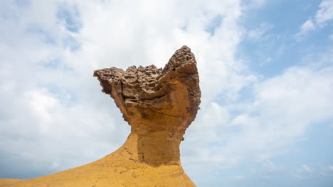 Time-Lapse-of-Clouds-and-Tourists-Around-Strange-Natural-Rock-Formation-in-Yehliu-Geopark,-Taiwan