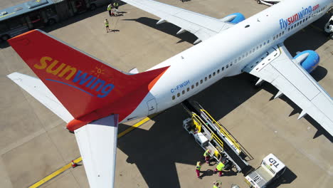 The-Sunwing-airplane-has-just-landed-and-the-ground-crew-prepare-to-disembark-the-passengers