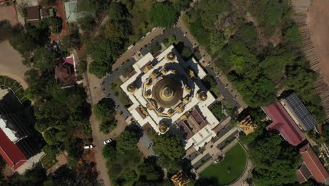 Top-down-rotating-Aerial-view-of-Buu-Long-Pagoda,-a-beautiful-Buddhist-temple-with-large-gold-roof-structure-in-Saigon,-Ho-Chi-Minh-City,-Vietnam-on-a-sunny-clear-day