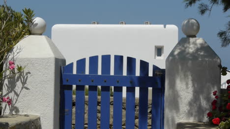 On-Mykonos-the-walls-are-all-white-and-the-joinery-is-painted-blue