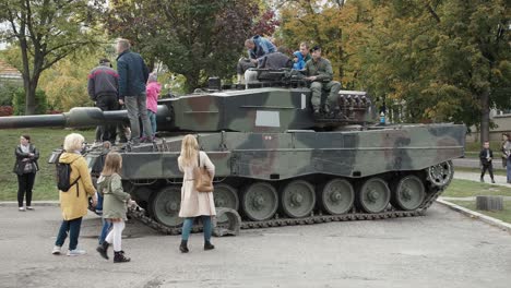 Children-are-watching-and-playing-on-the-tank