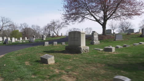 4K:-Driving-slowly-by-old-headstones-through-a-cemetery-on-a-beautiful-day