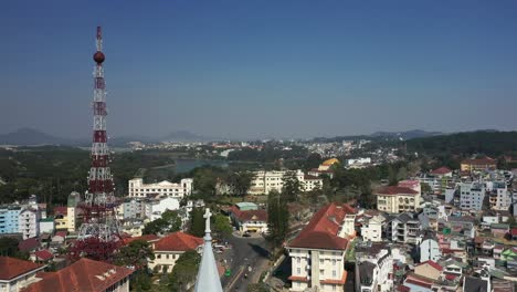 Drone-shot-of-mini-Eiffel-tower-and-church-spire-in-Da-Lat-or-Dalat-in-the-Central-Highlands-of-Vietnam-on-sunny-day