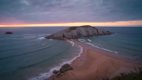 Covachos-island-and-beach-during-sunset-in-Santander,-Cantabria,-Spain