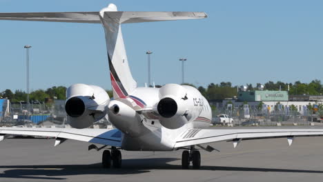 Private-Jet-Testing-Thrust-Reversers-on-Engine-when-Taxi-Out,-Behind