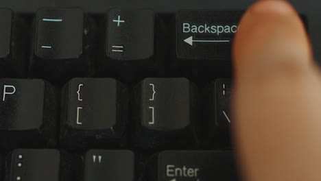 Mistyped-Words-Thus-Pressing-The-Backspace-Key-Five-Times---Close-Up-Shot
