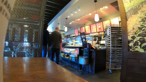 Time-Lapse-of-the-counter-of-a-busy-coffee-shop-on-a-week-day-afternoon
