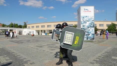 Police-characters-depicted-in-costumes-from-the-world-of-computer-games-in-the-exhibition-of-anime-comics-and-manga-lovers-AnimeFest-Brno-expo-camera-in-120fps