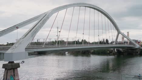 Landmark-Barqueta-Bridge-over-Guadalquivir-River-in-Seville,-Spain