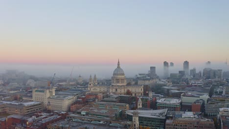 Establishing-dolly-forward-drone-shot-of-St-Pauls-cathedral-London-foggy-sunrise