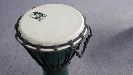 Djembe-Hand-Drum-On-The-Floor-Of-School-Music-Classroom