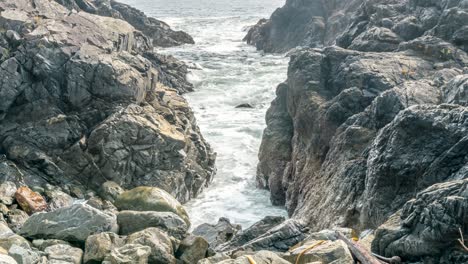 Timelapse-of-Waves-Crashing-through-a-Tunnel-of-Rocks-in-Ucluelet-BC
