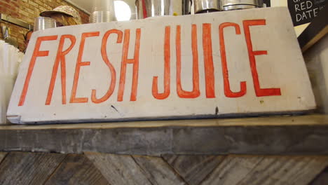 Fresh-Juice-Sign-at-the-Counter-of-Juice-Bar