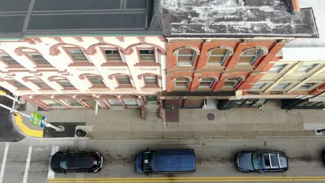 Descending-aerial-of-old-homes-and-office-buildings-in-Pittsburgh-PA-South-Side