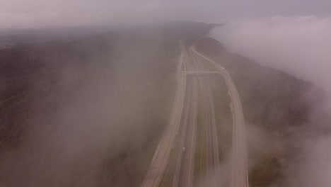Clouds-And-Fogs-Over-Interstate-75-And-Rarity-Mountain-Road-In-Newcomb,-Tennessee,-USA