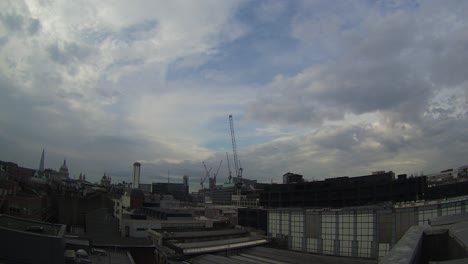 Rooftop-Time-Lapse-Over-Farringdon-With-Cranes-For-Crossrail-Under-Dramatic-Cloudscapes