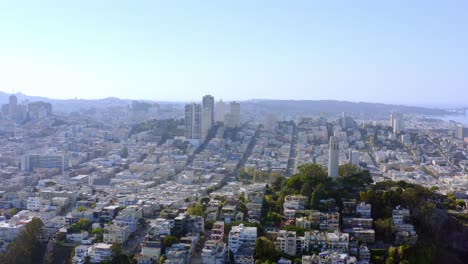 Aerial:-Coit-Tower-and-San-Francisco-downtown,-drone-view