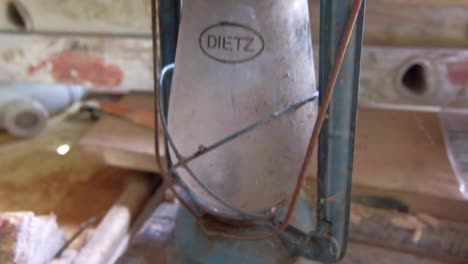 Old-Antique-Retro-Lantern-In-Messy-Workshop