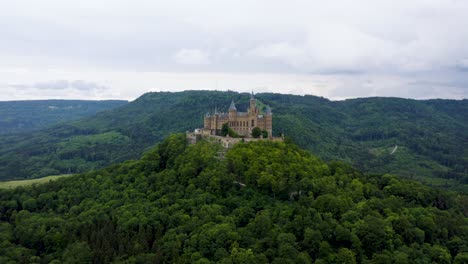 Aerial-of-Hohenzollern-Castle-on-the-Hill-between-Beautiful-Nature